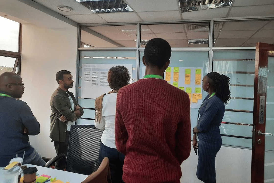 YUX, GSMA and Safaricom teams working together during the design and product iteration workshop to translate field research insights into priority opportunity areas and potential product concepts.&nbsp;